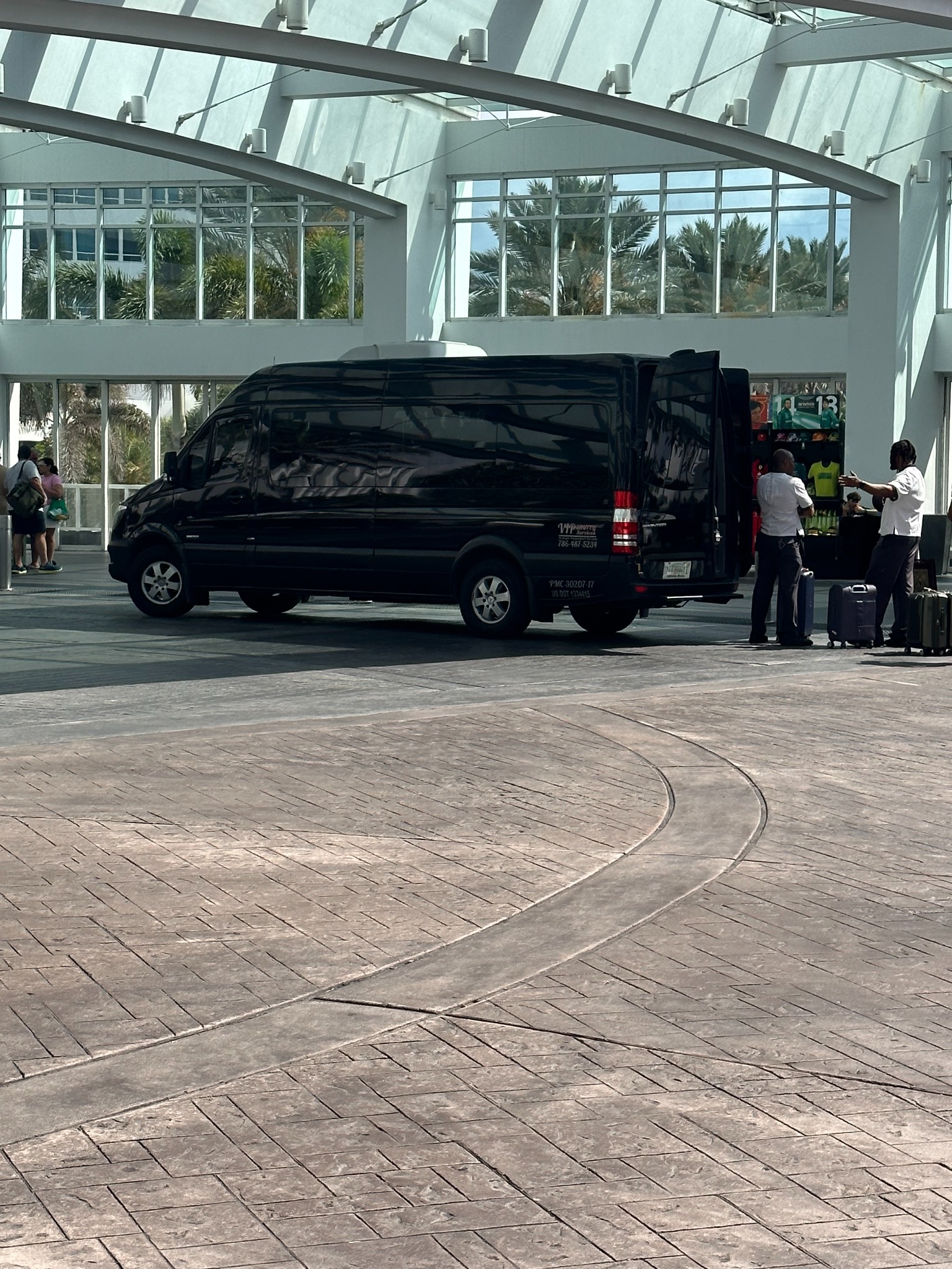 VIP Shuttle Services Sprinter at a passenger pickup